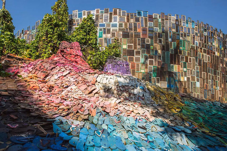 Some 5,000 flip-flops comprise this art installation at the Potato Head Beach Club in Seminyak, Bali integratng biophilia with Upcycled Place-based Design