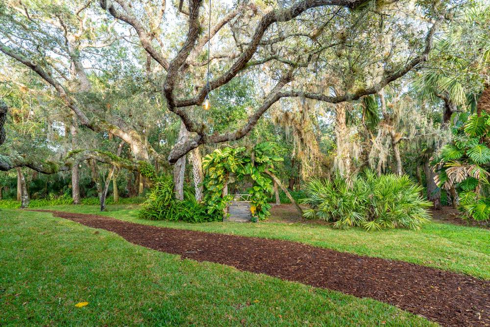 A garden trail through mossy oaks at ChoZen