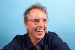 Dan Buettner, Blue Zones Project creator, smiling in a portrait