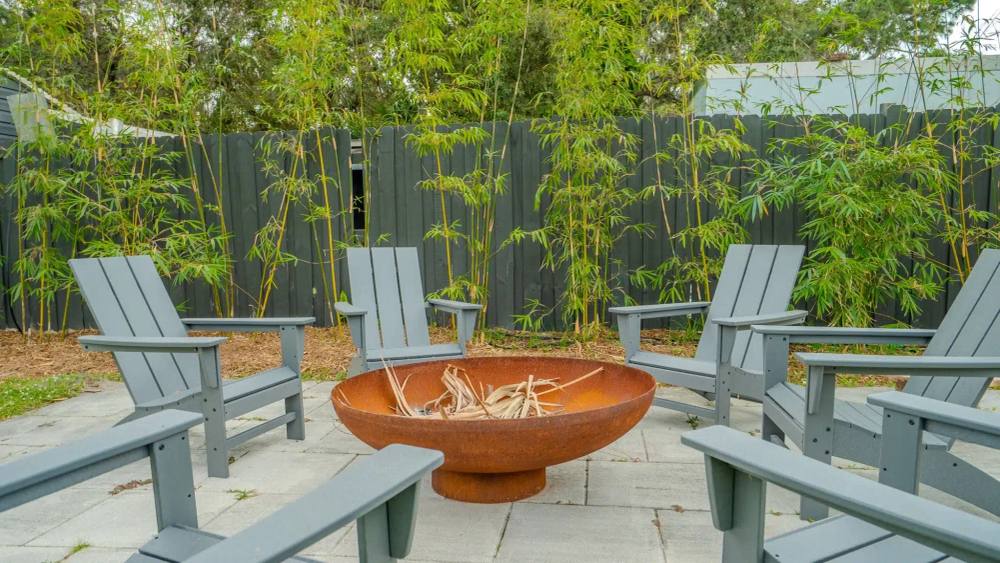 Fire pit and Adirondack chairs for breakout conversations at ChoZen
